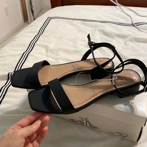 Black sandals never worn